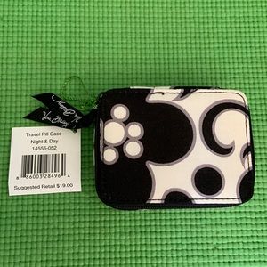 Vera Bradley pill cases.